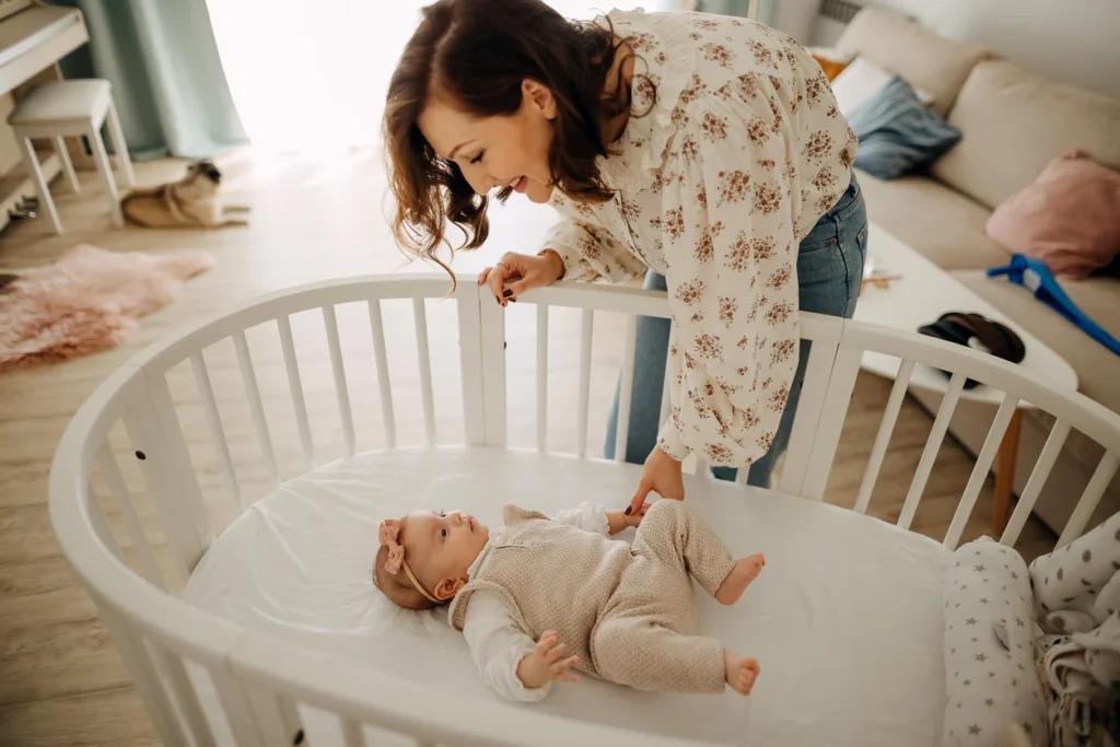 how to keep infant from rolling over in crib, newborn rolling on side, how to keep baby from rolling over in crib, how to stop baby from rolling over in crib, exercises to help baby roll over, exercises to help baby roll, baby can roll back to front but not back, rolling signs,